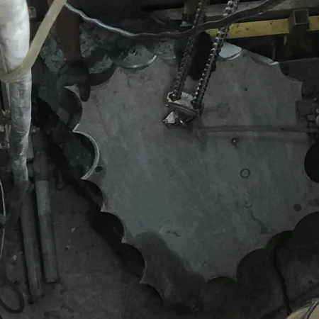 Confined space mechanical works at PS30 showing core drilling and installation of 1000mm diameter air recirculation duct within reinforced concrete shaft.
