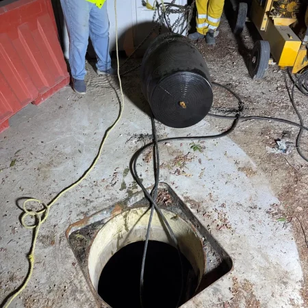 Confined space mechanical works at PS30 showing core drilling and installation of